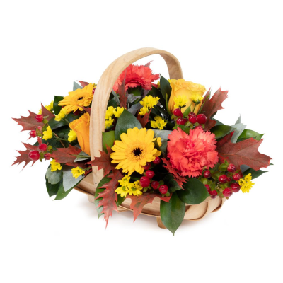 Autumn Hedgerow Basket - A collection of seasonal flowers and foliage arranged in a natural basket.