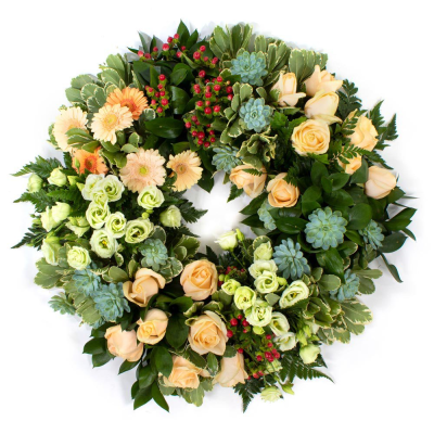 Eco Wreath SYM-354 - This open style wreath is designed on a biodegradable eco base. Made to order by our skilled florists, let us know what colour combination you would prefer, and we’ll select the best available flowers.